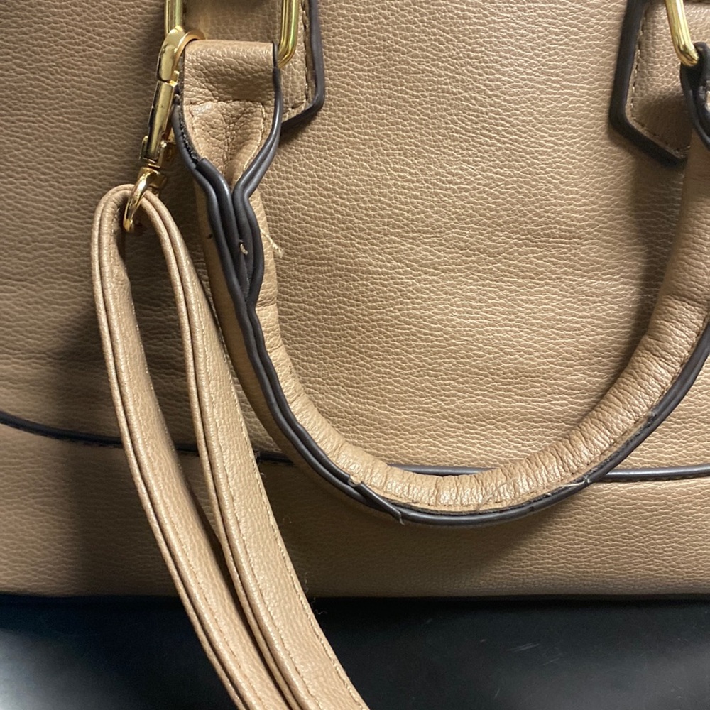 ‘Tan silk shoulder bag.’